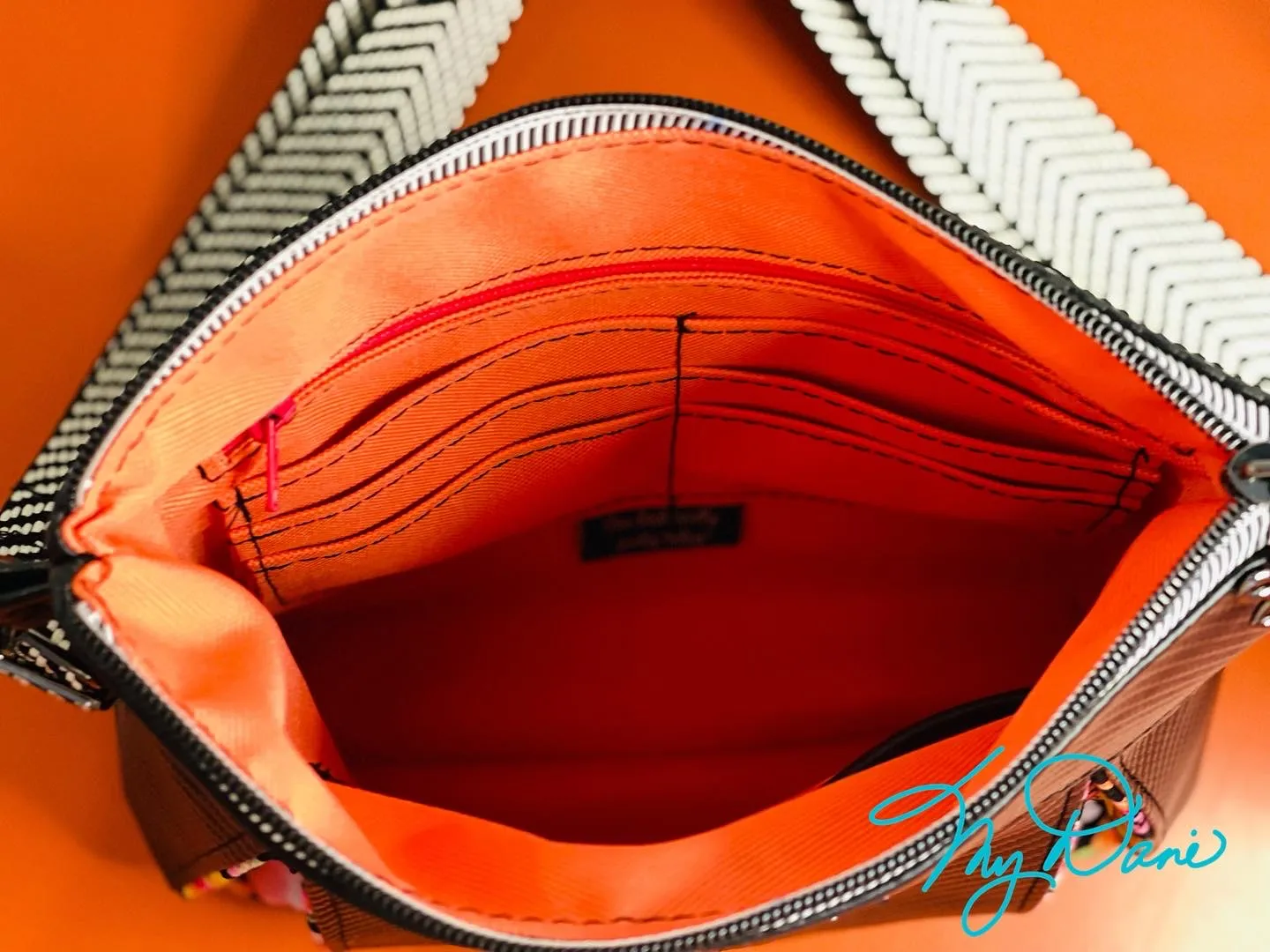 The Ayla Crossbody Bag in Bright Floral and Textured Black.