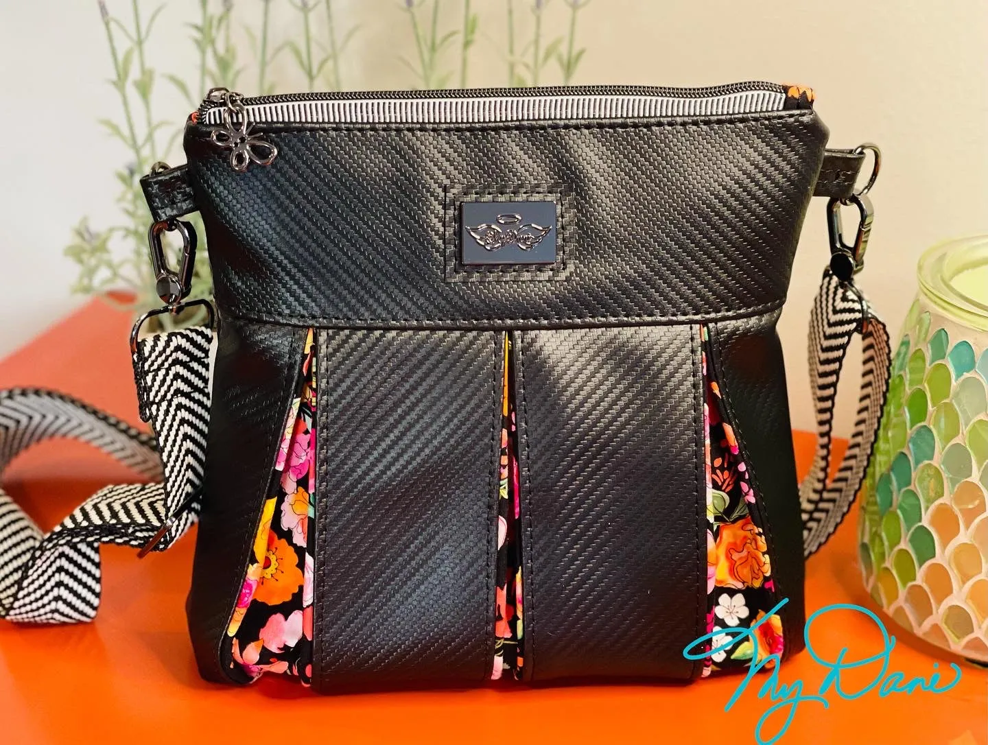 The Ayla Crossbody Bag in Bright Floral and Textured Black.
