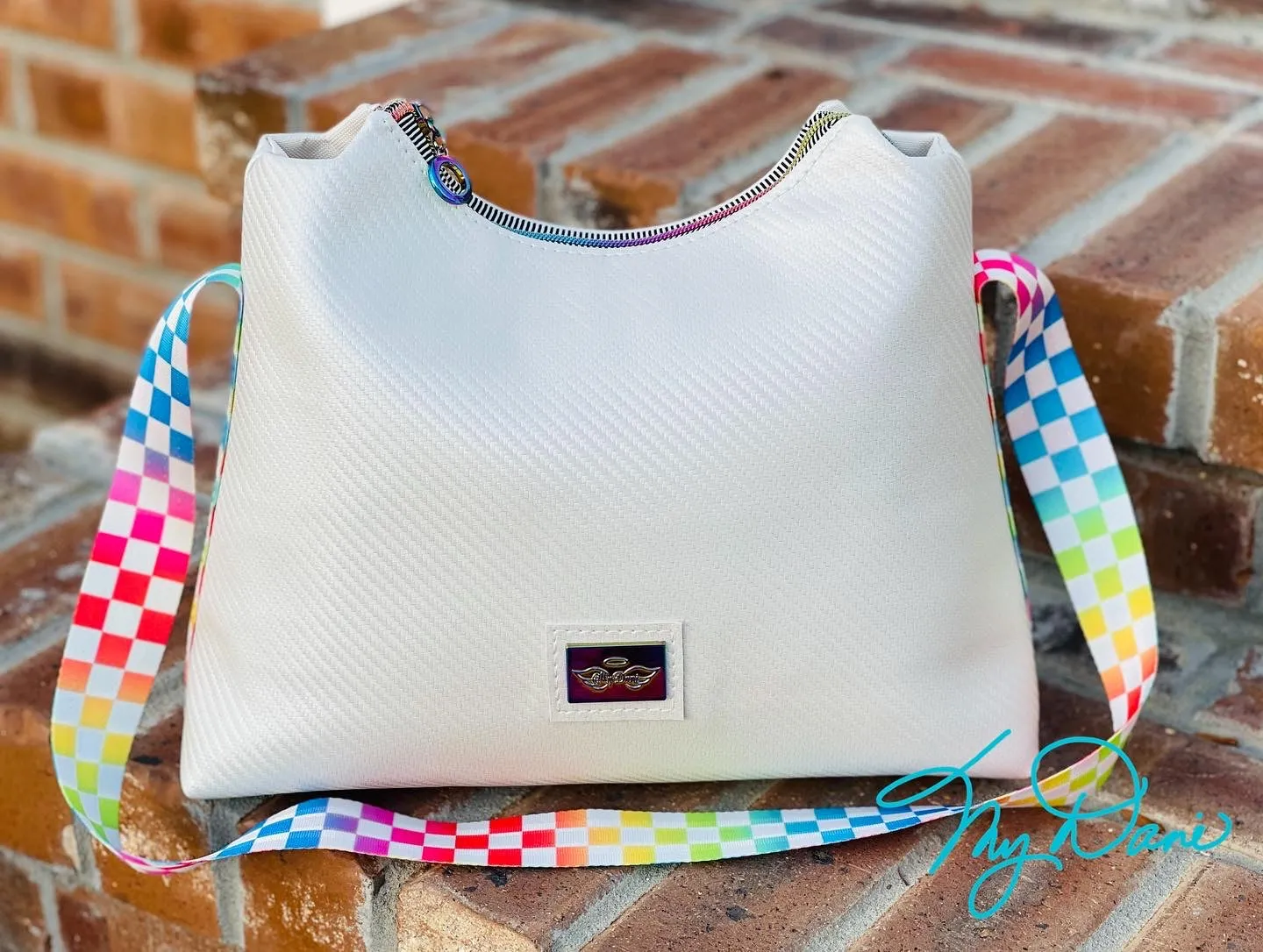 The Beanie Baguette Handbag in textured off white w/racing stripes webbing