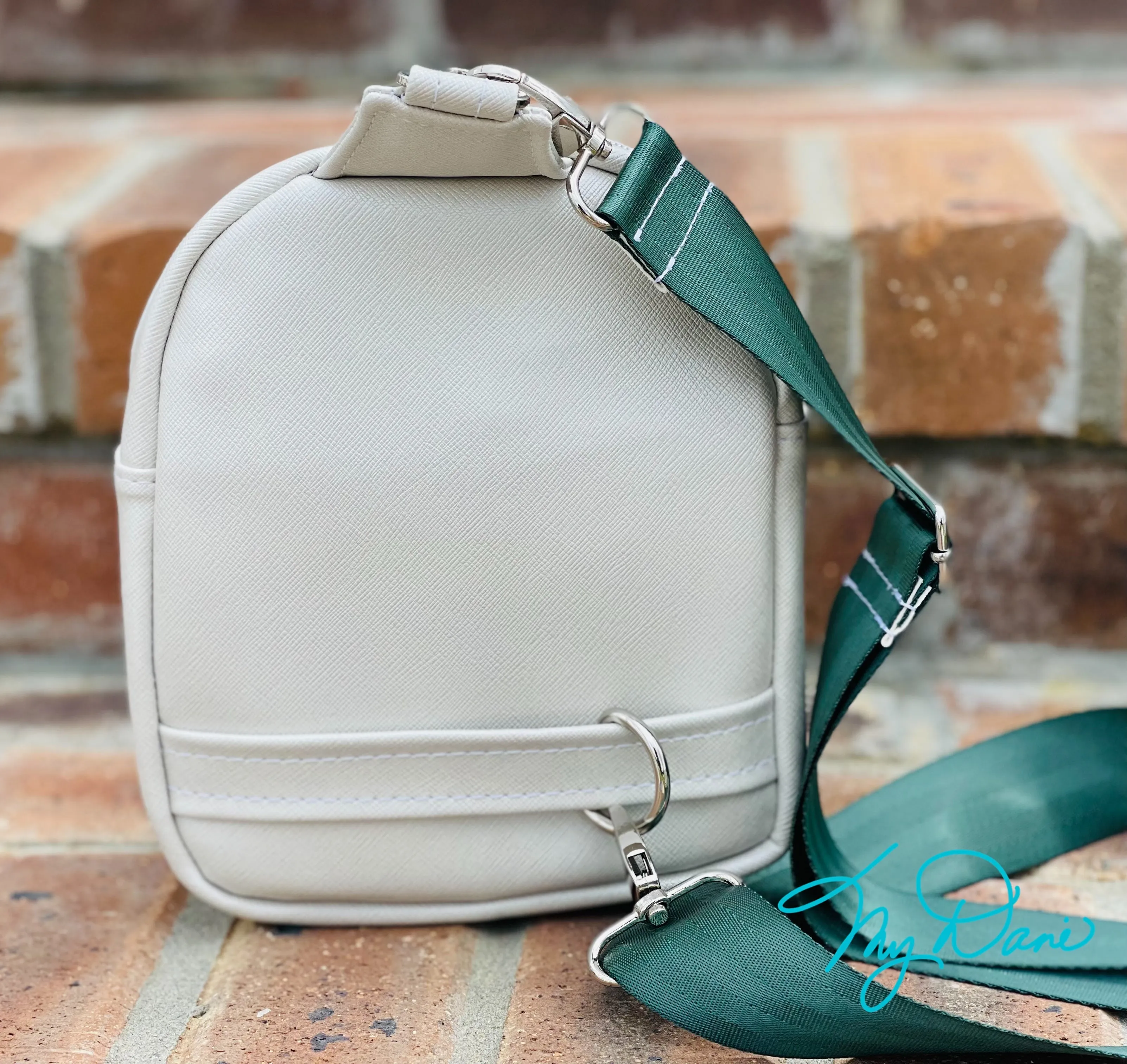 The MavPac Mini Backpack in Cats and Off White