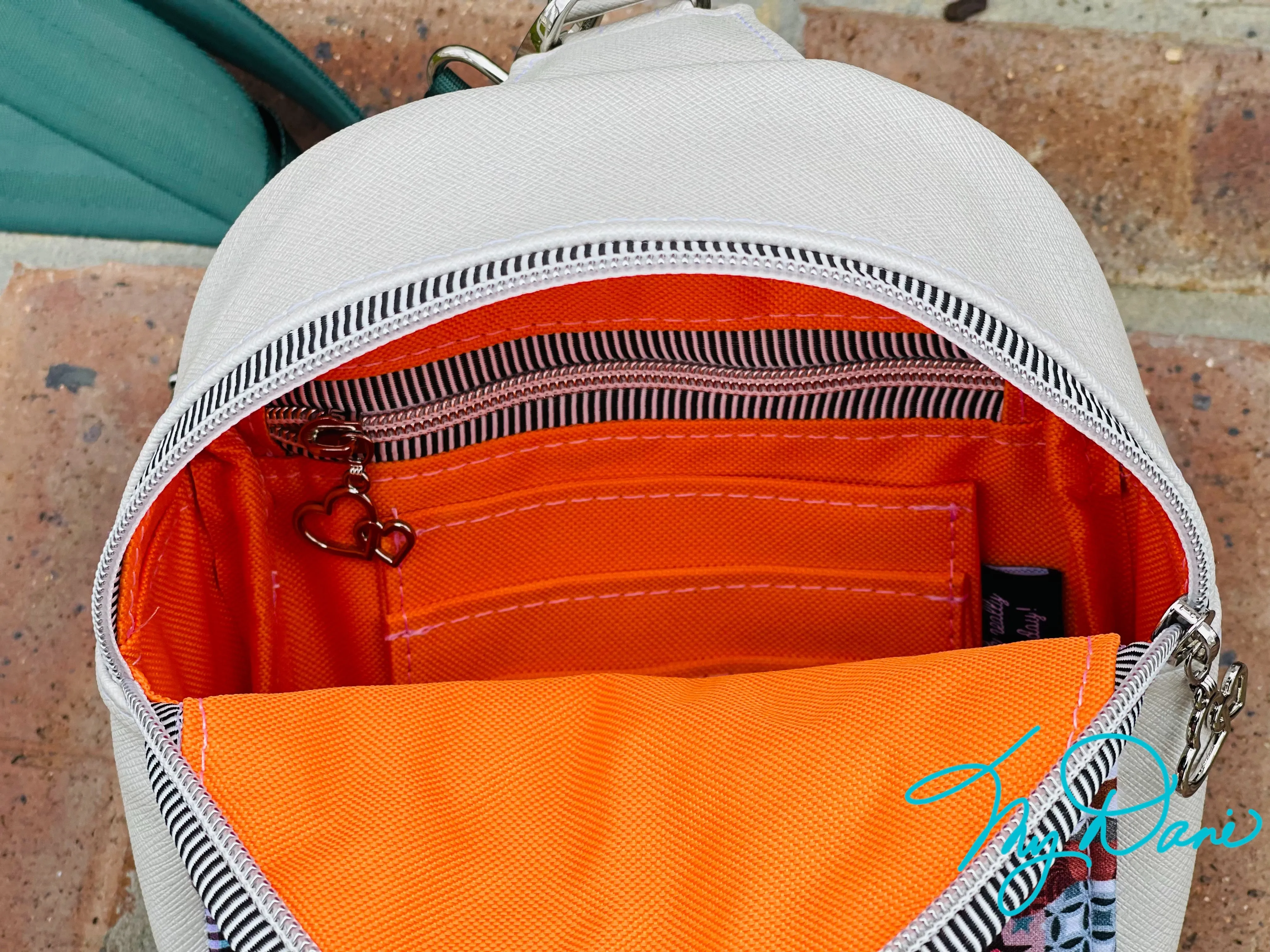 The MavPac Mini Backpack in Cats and Off White